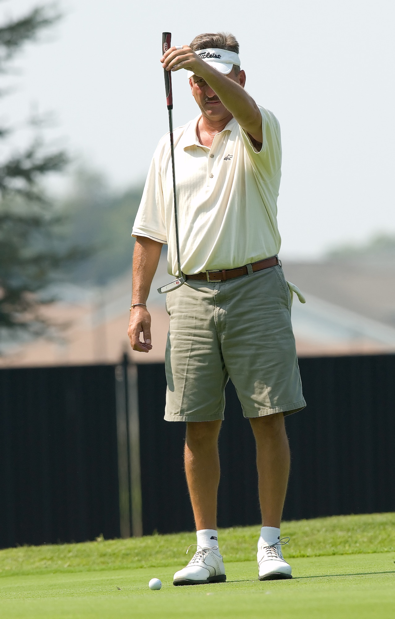 Chief Master Sgt. Fred Eason, 512th Aircraft Maintenance Squadron, lines up a putt during the Bluesuiters Golf Tournament on base Sept. 4. The annual event features community members and Dover Team members coming together for a day of fun and camaraderie. Chief Eason's teammates were Al Burris, Buster Estabrook and Kevin Gillis. (U.S. Air Force photo/Jason Minto)
