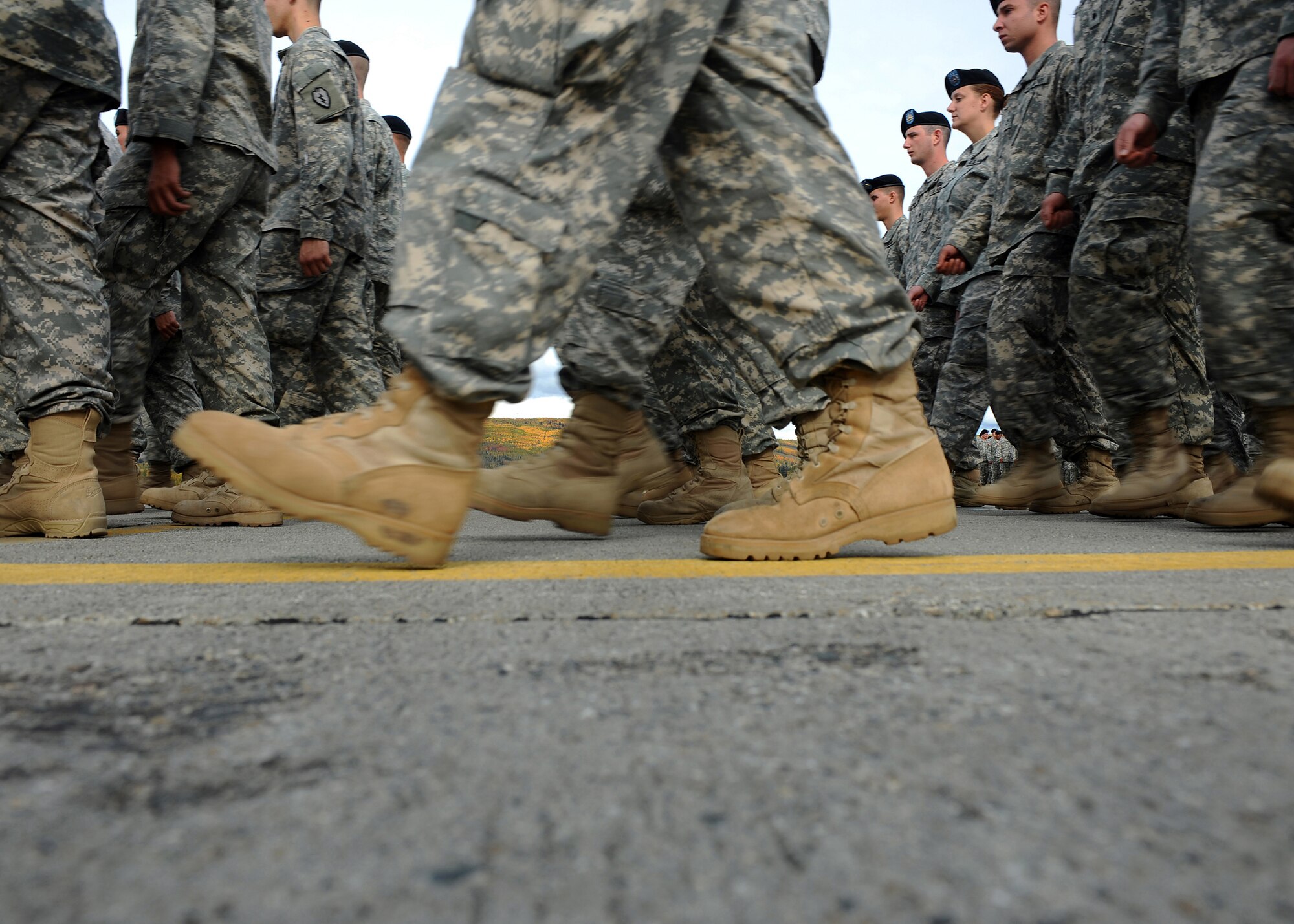 Soldiers from the 1st Stryker Brigade Combat Team, 25th Infantry Division, marches in a deployment ceremony on Sept. 10, 2008 on Fort Wainwright. The deployment ceremony included a pass-in-review portion where the families could view the whole brigade. (U.S. Air Force photo by Airman 1st Class Willard E. Grande II)