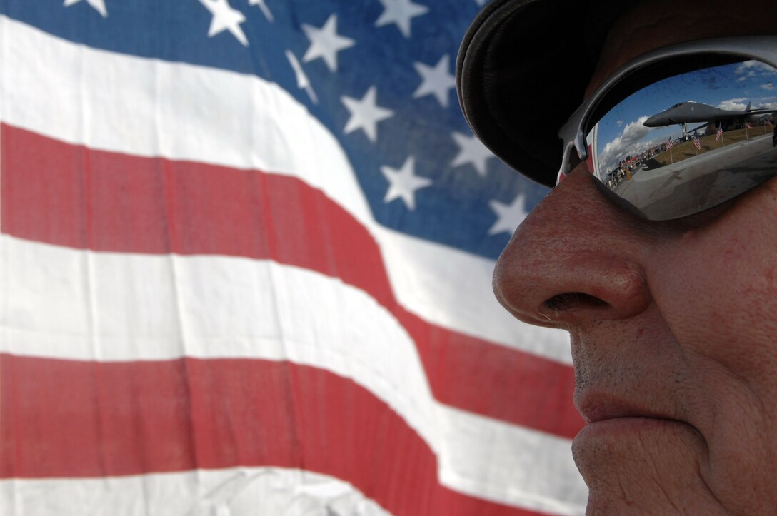 Ed Woidt, Patriot Guard Rider, looks at the B1-B Lancer static display during his attendance at the 9/11 memorial at the South Dakota Air and Space Museum Sept. 11. The Patriot Guard Riders stand the flag line to honor America's fallen heroes, veterans and present members who continue to serve. (U.S. Air Force photo by Airman Corey Hook)