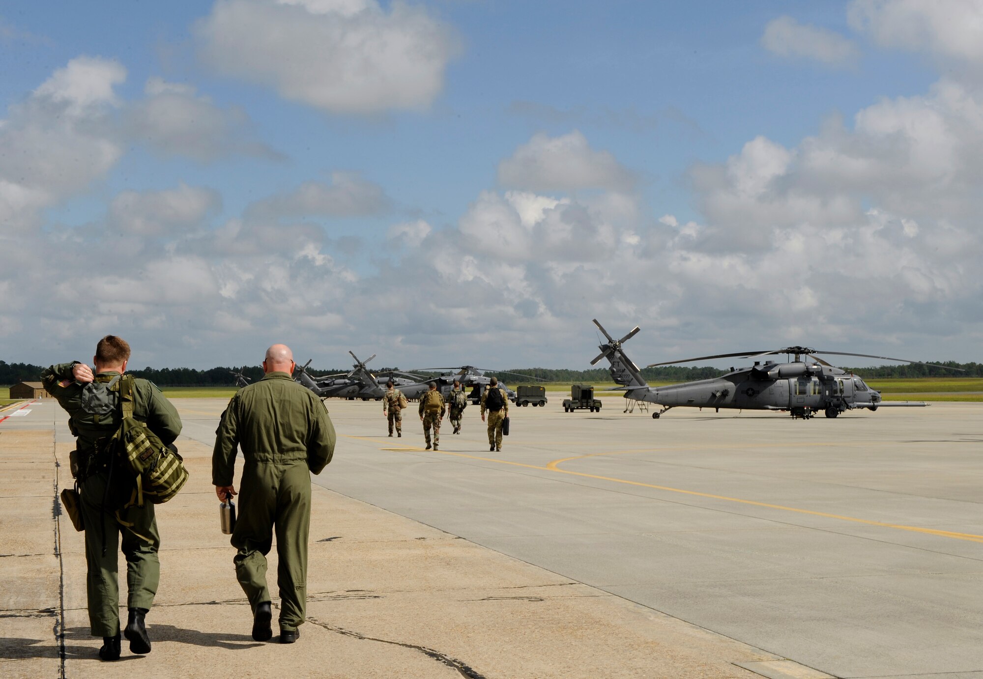 MOODY AIR FORCE BASE, Ga. – Aircrews from the 23rd Wing walk towards their HH-60G Pave Hawks before departing for Hurricane Ike support here Sep. 12. The 41st Rescue Squadron will establish a staging location in Gulfport, Miss. (U.S. Air Force photo by Senior Airman Brittany Barker)