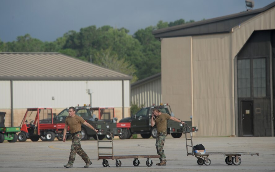 MOODY AIR FORCE BASE, Ga. – 38th Rescue Squadron members finish loading an HH-60G Pave Hawk with gear before it takes off in support of Hurricane Ike relief efforts here Sept. 12. The deploying team will establish a staging location in Gulfport, Miss. (U.S. Air Force photo by Senior Airman Gina Chiaverotti)  