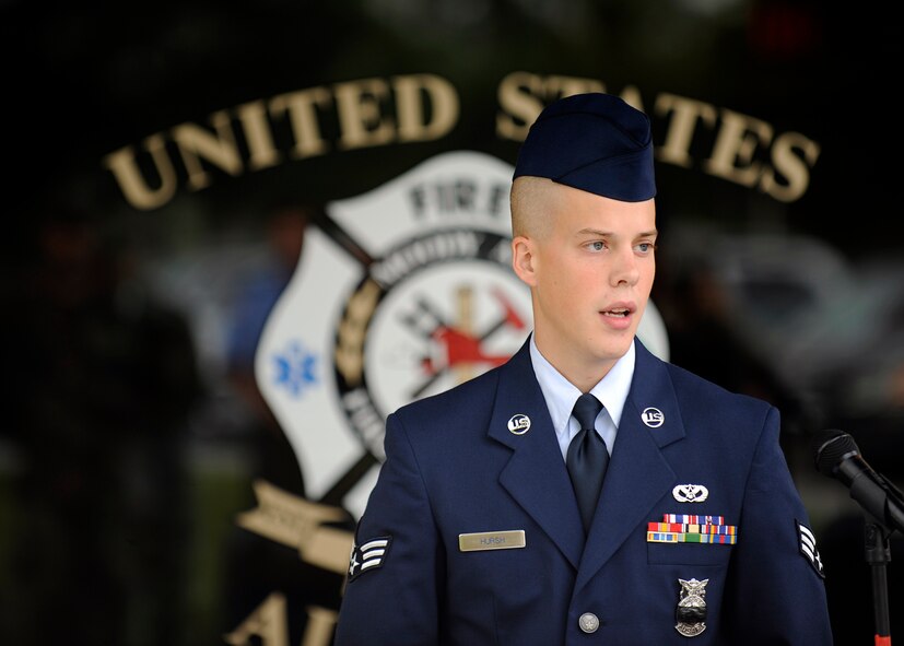 MOODY AIR FORCE BASE, Ga. -- Senior Airman Warren Hursh, 23rd Civil Engineer Squadron fire fighter, speaks during a September 11 memorial ceremony here Sep. 11. During the ceremony the fire fighters honored and remembered the lives lost during the terrorist attack. (U.S. Air Force photo by Senior Airman Brittany Barker)