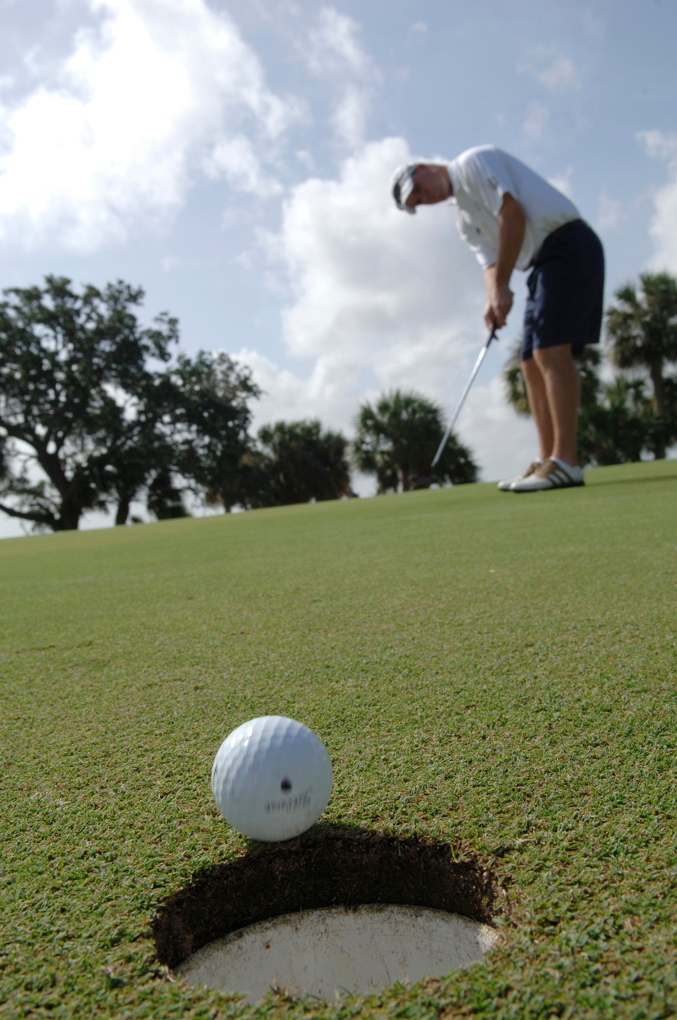 U.S. Air Force A1C John Little practices his gold swing at MacDill AFB September 02, 2008.  A1C Little has won two gold medals for the MacDill golf team.  
  (U.S. Air Force photo by Amn Kate Benoy) (Released)