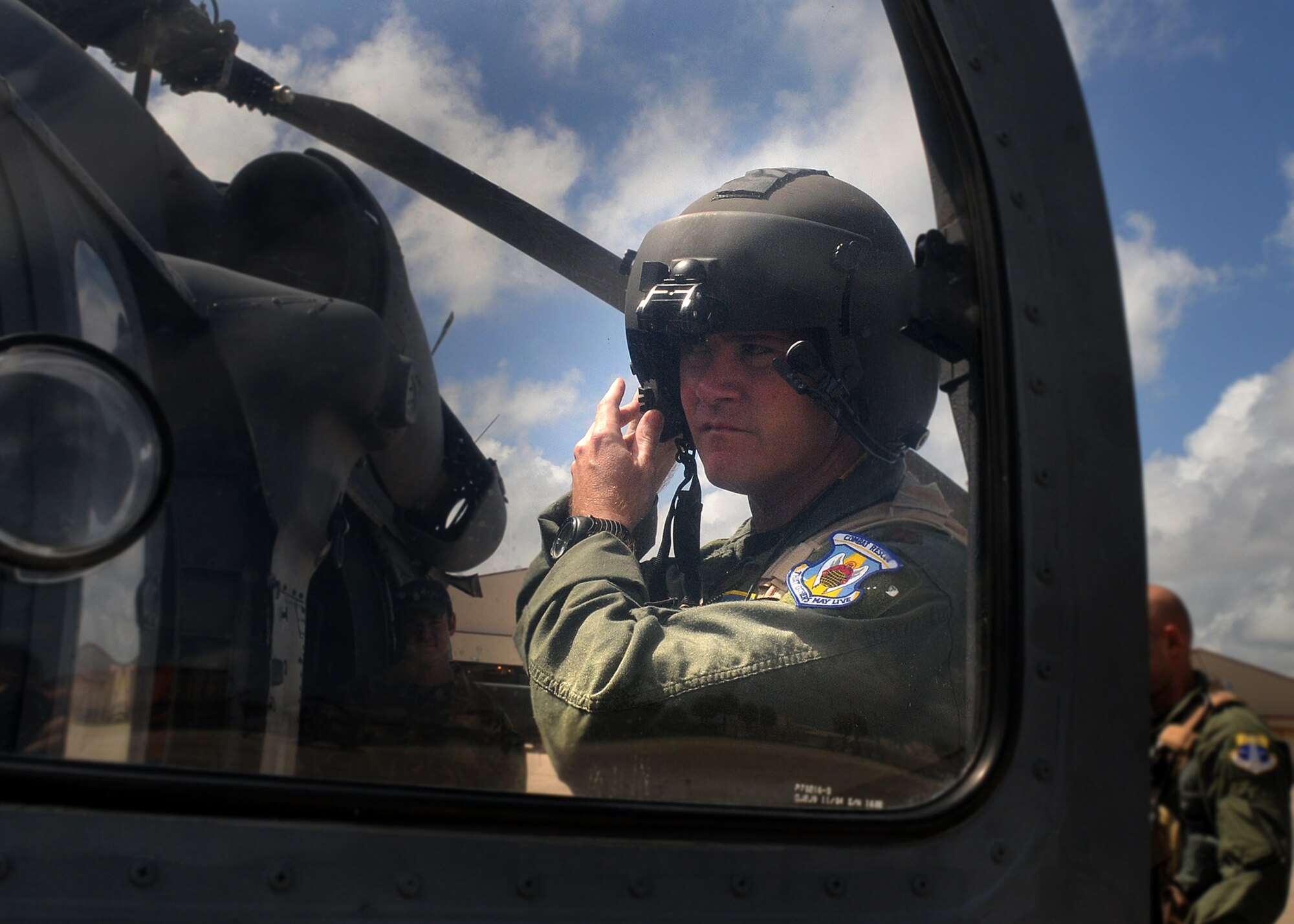 PATRICK AIR FORCE BASE, Fla. -- An Air Force Reserve helicopter pilot with the 920th Rescue Wing here prepares to fly to the Gulf region, where he and a group of wing Airmen will stand ready to provide search and rescue support for those affected by Hurricane Ike. (U.S. Air Force photo/Capt. Cathleen Snow)