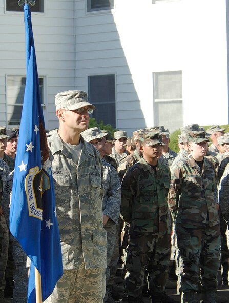 FAIRCHILD AIR FORCE BASE, Wash. – Team Fairchild Airmen stand at parade rest during a Patriot’s Day Retreat here Sept. 11. Almost 1,000 Fairchild Airmen and guests from Spokane, Wash., attended the ceremony commemorating the men and women who died in the World Trade Center and Pentagon terrorist attacks Sept. 11, 2001. (U.S. Air Force photo / Staff Sgt. JT May III)