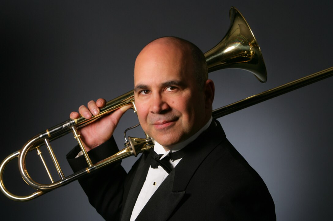 Mr. Joseph Alessi, world-renowned soloist and principal trombone of the New York Philharmonic, will be soloing with the USAF Heartland of America Band's Brass in Blue as they present 'Slides Across the Heartland.'  The free performance will be Monday, October 20, 2008 at 7:30 p.m. at the Holland Performing Arts Center in Omaha, NE.