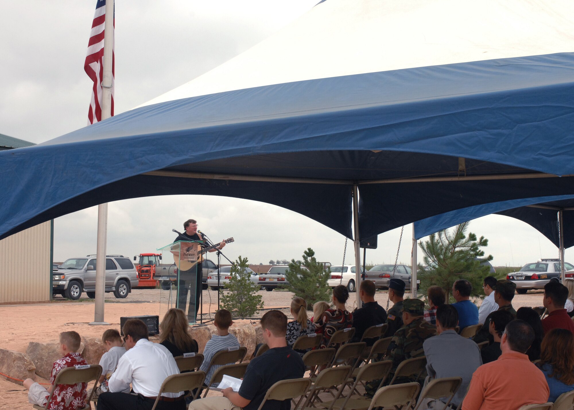 CANNON AIR FORCE BASE, N.M. - Van Walworth performs for the Clovis and base communities at Patriot Outdoors Sept. 11.  Patriot Outdoors held a memorial ceremony for servicemembers serving during and since the attacks on Sept. 11, 2001. (U.S. Air Force photo/Airman 1st Class James R. Bell)