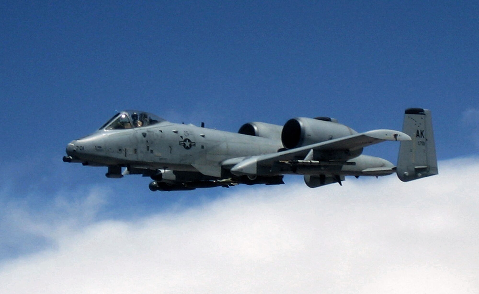 An A-10 Thunderbolt II flies a combat mission supporting Operation Enduring Freedom over Afghanistan.  A-10s provide close-air support and employ a wide variety of conventional munitions, including general purpose bombs. (U.S. Air Force photo/1st Lt. Jeff Ballenski)