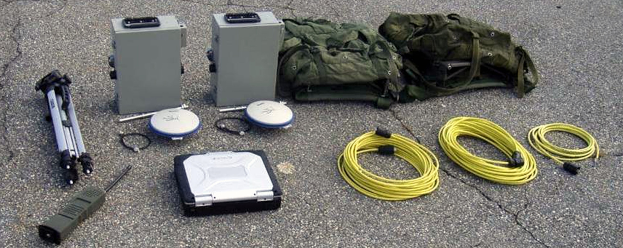 This photo shows the entire package for a portable contingency landing system that's carried in backpacks.  This equipment was used during Air Mobility Battlelab's Portable Contingency Landing System Initiative concept demonstration at Duke Field, Fla., in July 2008.  The initiative calls for a CLS that can bridge the gap between current precision landing systems and a future, fully-automated, on-board autonomous landing capability for military aircraft landing in remote airfields.  The portability factor helps contingency response forces who set up the contingency landing system.  (U.S. Air Force Photo)