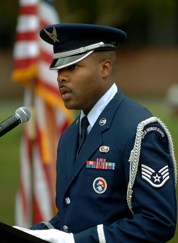 LANGLEY AIR FORCE BASE, Va. - Staff Sgt. Dion Lewis, Base Honor Guard, speaks during the presentation of the flag at the City of Hampton Proclamation for Day of Remembrance and Hope on Sept. 11. (U.S. Air Force photo/Tech. Sgt. Levi Collins) 