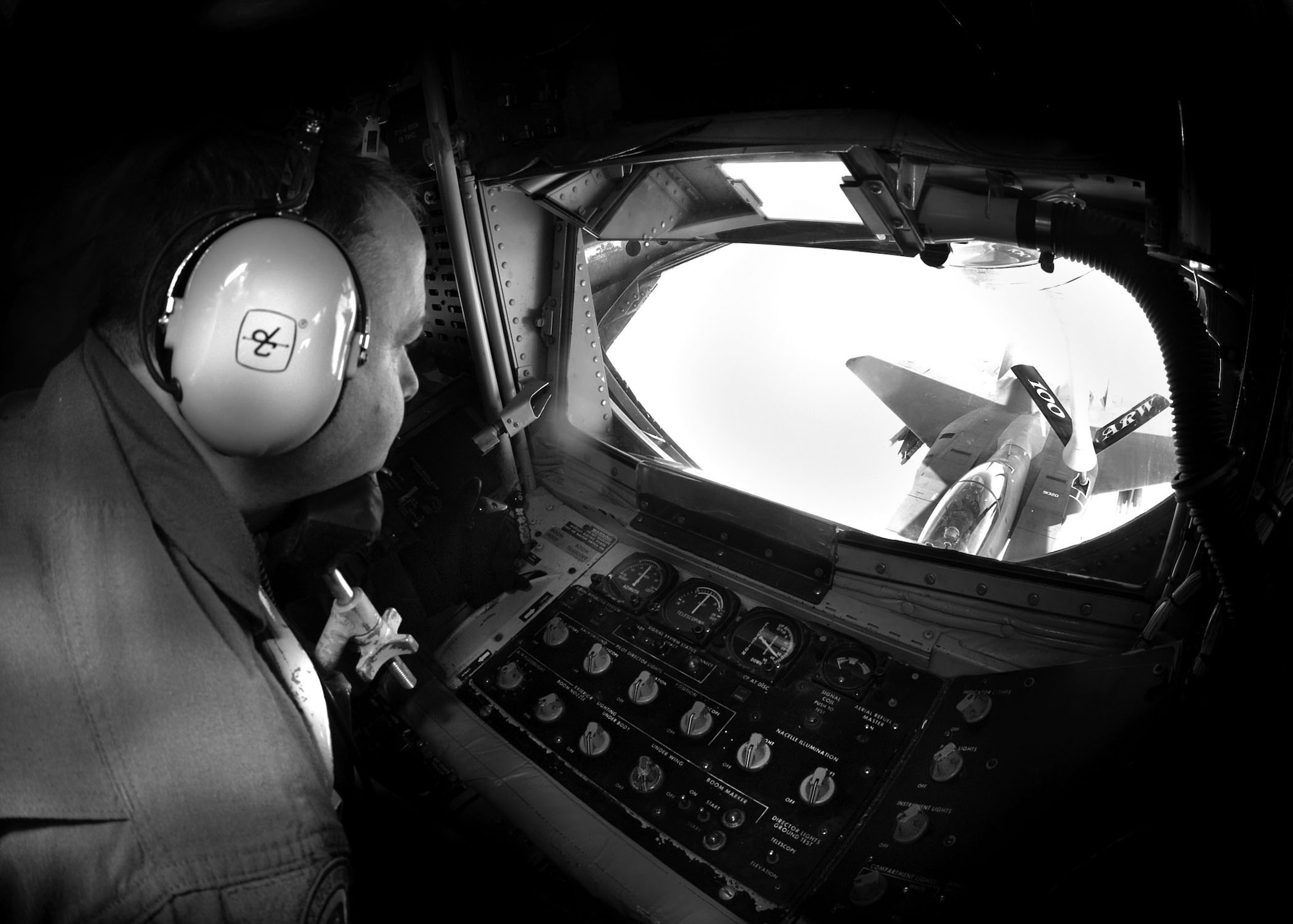 Tech. Sgt. RaileR Cantrell, 351st Air Refueling Squadron, refuels an F-15 from RAF Lakenheath Aug. 18. During the flight, Sergeant Cantrell passed the 6,000 flying hours benchmark, which is a major milestone for boom operators in the Air Force. (U.S. Air Force photo by Staff Sgt. Tyrona Pearsall)