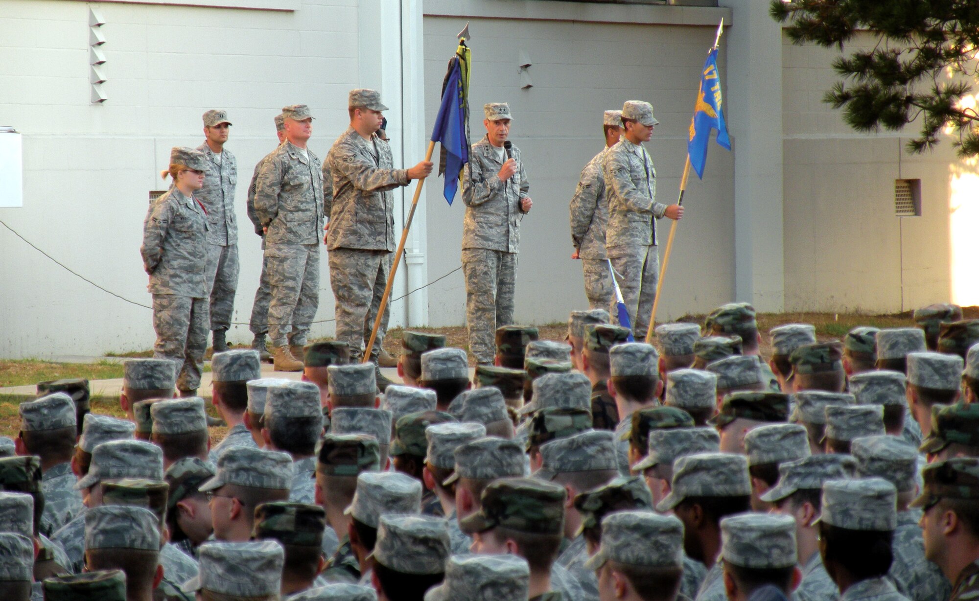 Major General Craig Koziol, Air Force Intelligence Surveillance and Reconnaissance Agency commander, spent the day with the Airmen of the Presidio of Monterey, Calif., on Aug. 28. General Koziol received unit mission briefs from the 311th Training Squadron, 314th Training Squadron and the Defense Language Institute Foreign Language Center. The general had the opportunity to visit Airmen in class, observe first-hand cutting edge language training technology, and had breakfast with a group of select students. General Koziol addressed the weekly squadron formation providing words of encouragement and insight into the operational environment the Airmen will soon be immersed in. At the formation, Maj Gen Koziol presented Chief Master Sergeant Crystle Flowers with his commander’s coin. As first sergeant for the 311 TRS, Chief Flowers has been instrumental in developing the next-generation of Airmen linguists at what was, until June 30, the largest squadron in the Air Force with an average of more than 1,600 Airmen assigned monthly. (U.S. Air Force photo)
