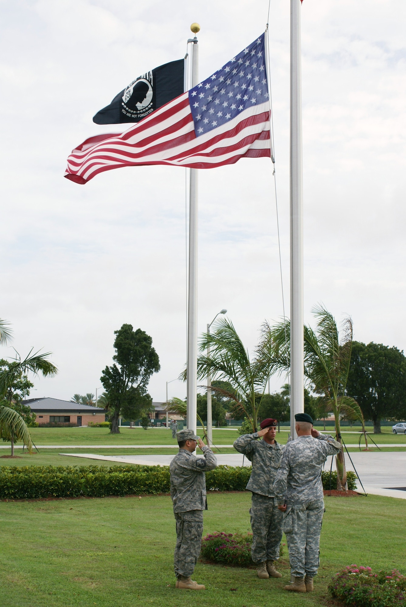 SOCSOUTH troops salute the U.S. Flag as it is lowered to half staff to remember the victims of Sept. 11 during the 2008 remembrance ceremony at Homestead Air Reserve Base, Fla. SOCSOUTH is a subordinate component for special operations under the U.S. Southern Command, which is headquartered in the City of Doral, Fla. The command’s Area of Focus encompasses the land mass and adjacent waters of Latin America south of Mexico covering about 15.6 million square miles.  (U.S. Air Force photo/Tim Norton)