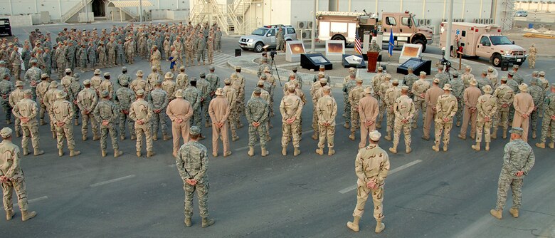 SOUTHWEST ASIA -- More than 200 members of the 380th Air Expedtionary Wing gather around the Circle of Honor here during the Patriot Day ceremony to commemorate the fallen responders from the 2001 terrorist attacks. (U.S. Air Force photo/Tech. Sgt. Christopher A. Campbell)(released)