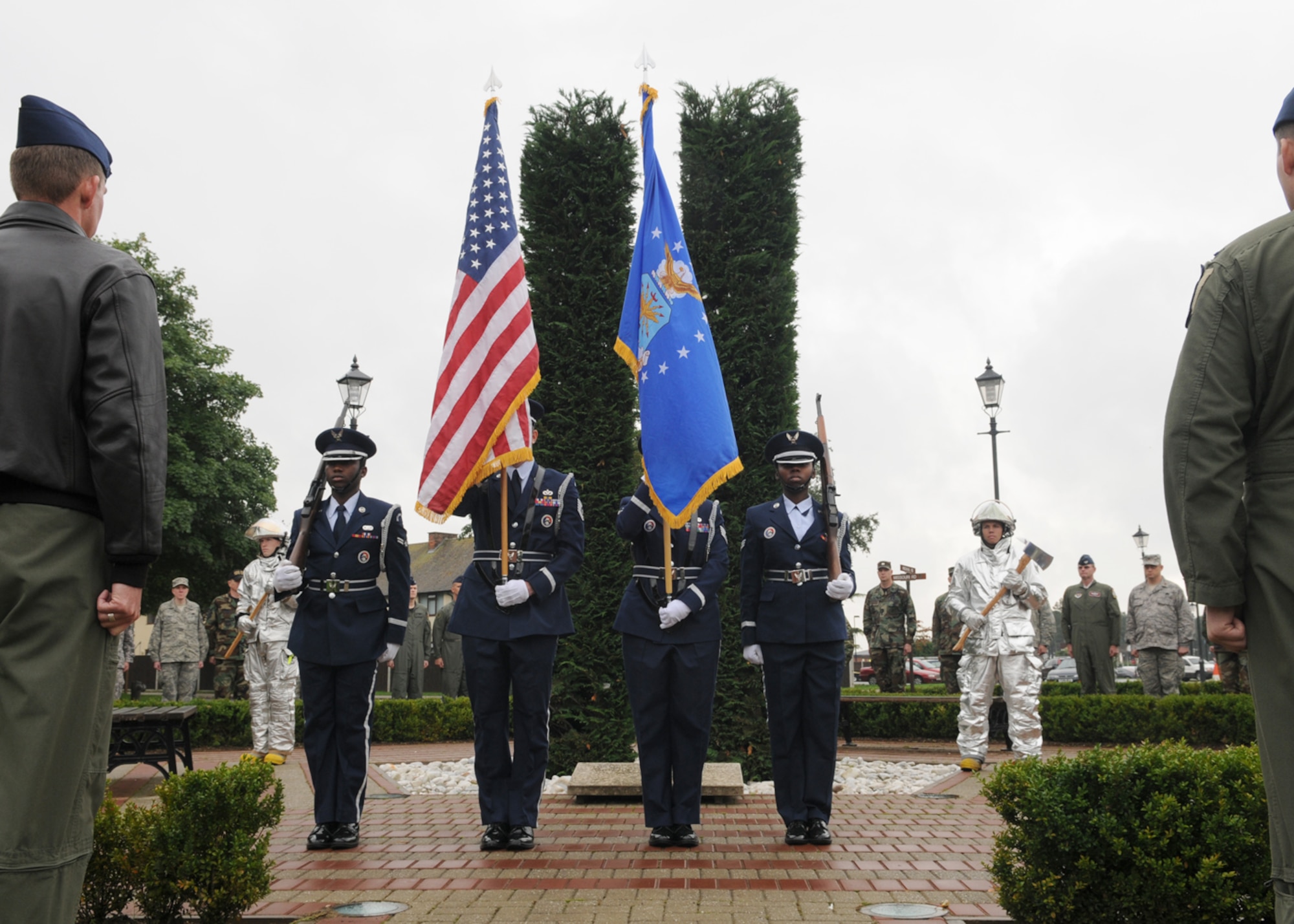Members from the Team Mildenhall Color Guard post the colors during the Sept. 11 Memorial Service held at the Bob Hope Community Center at RAF Mildenhall Sept. 11, 2008. The color guard was there to honor those who lost their lives during that fateful day in 2001. (U.S. Air Force photo by Staff Sergeant Jerry Fleshman)  