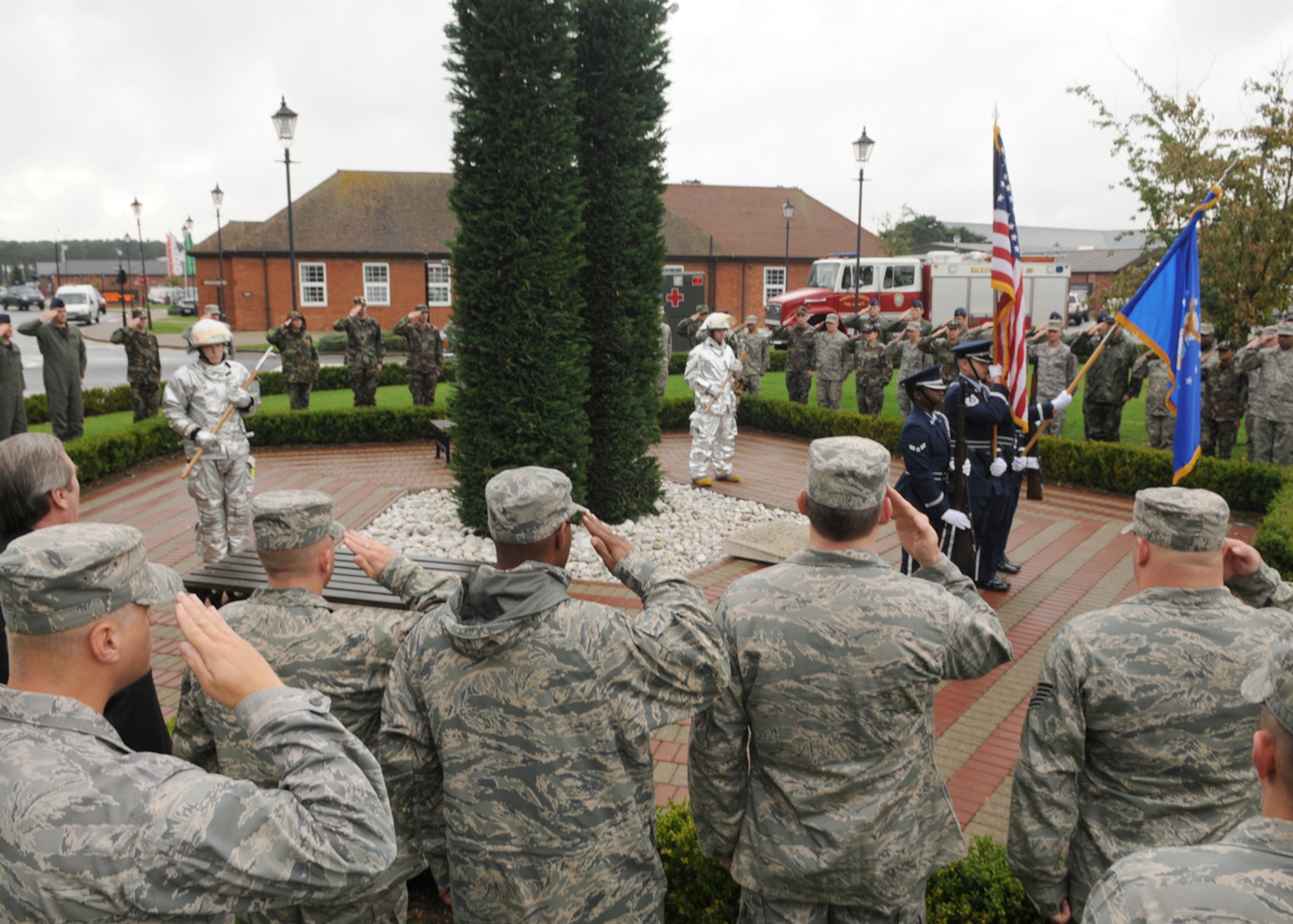 Mildenhall Airmen participate in the 9/11 Memorial Service held at the Bob Hope Community Center located on RAF Mildenhall, Sept. 11, 2008. The memorial service was held to honor and remember all who lost their lives during the tragic events that unfolded on this day in 2001. (U.S. Air Force photo by Staff Sergeant Jerry Fleshman)