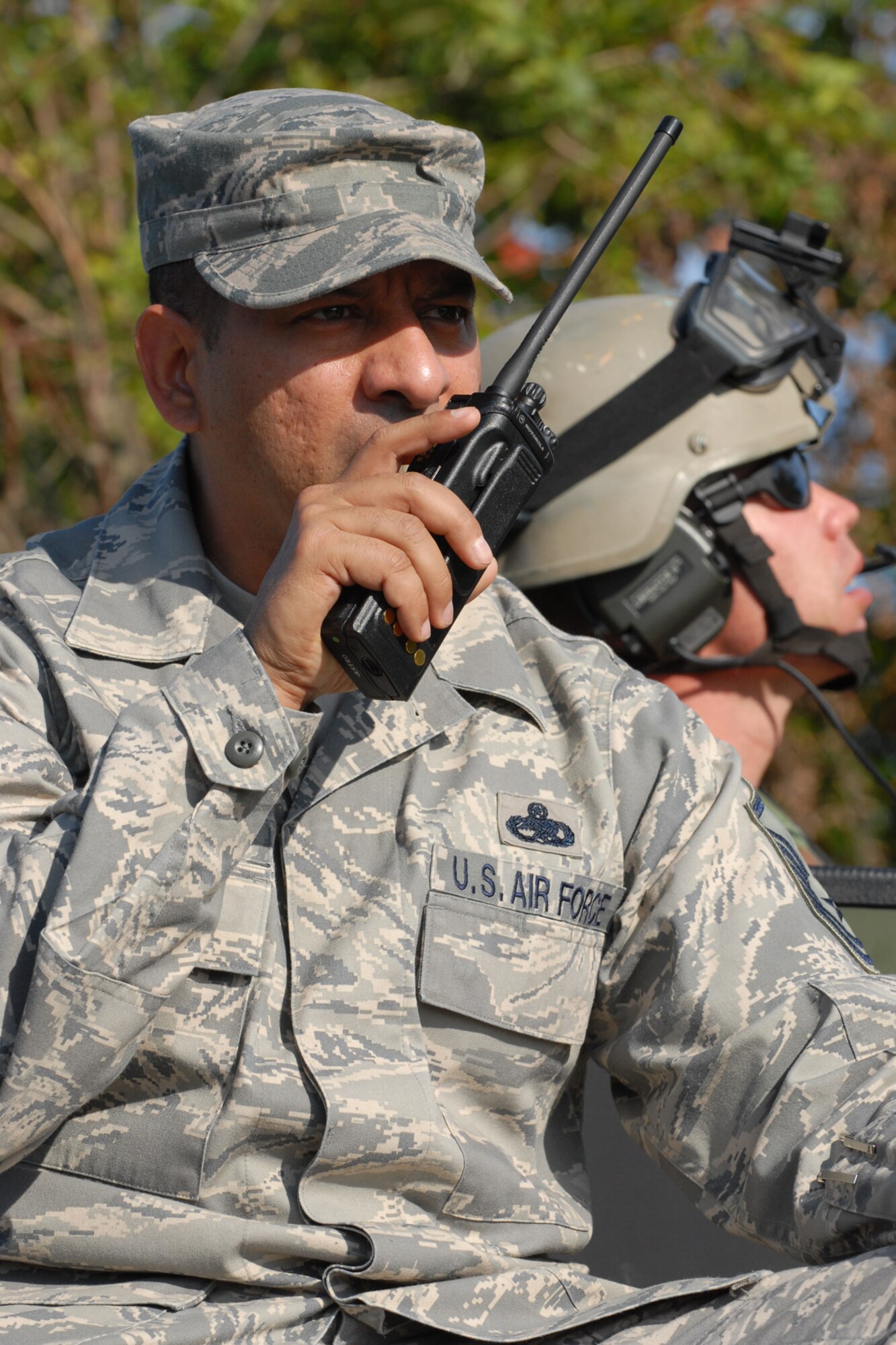 MISAWA AIR BASE, Japan -- Master Sgt. Angel Ramos, 35th Fighter Wing, communicates with the convoy during the Diesel Weasel Exercise Sept. 11, 2008. Diesel Weasel was a five-day exercise preparing pilots for deployment. (U.S. Air Force photo by Airman 1st Class Jamal D. Sutter) 