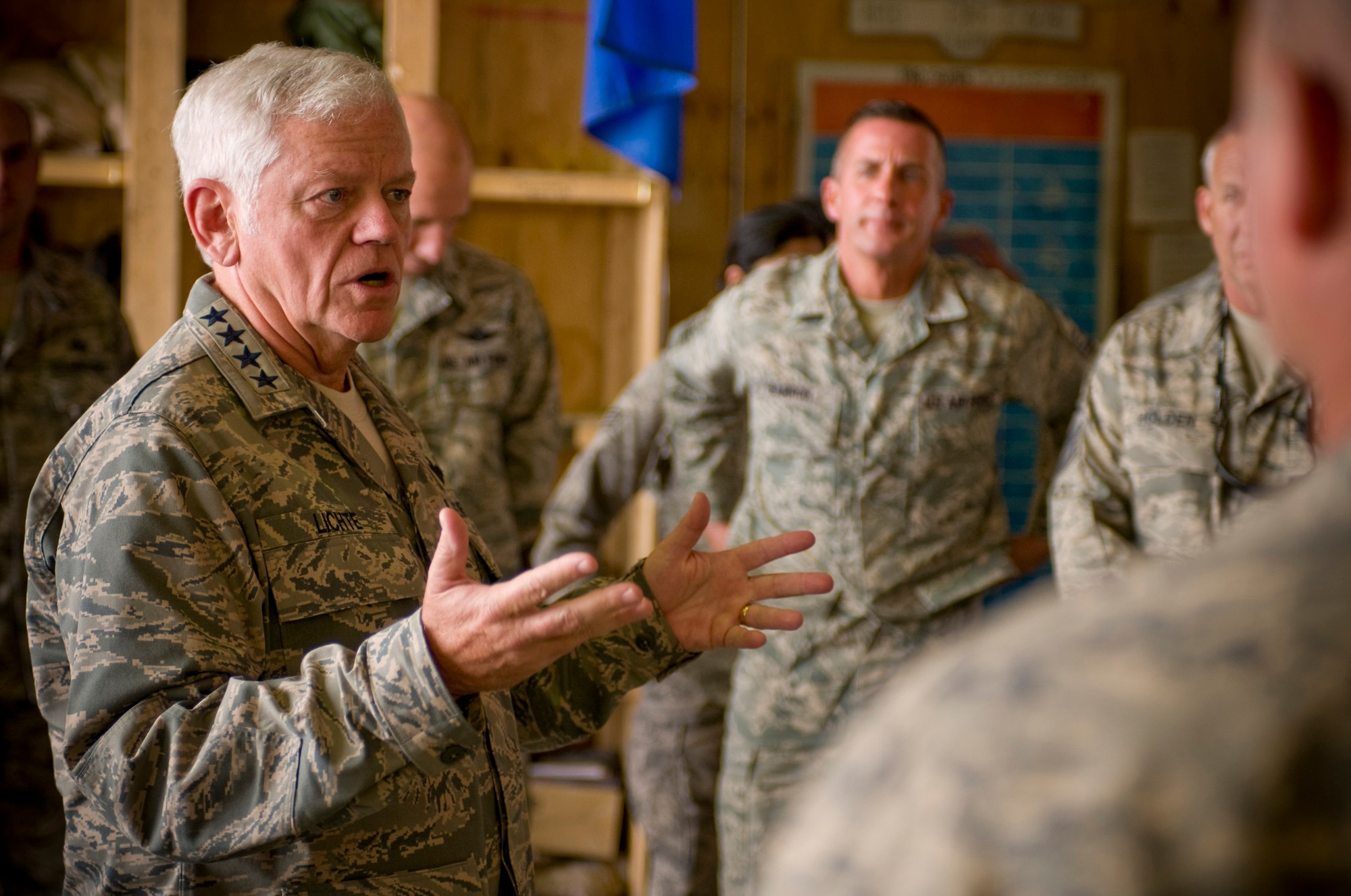 BAGRAM AIR FIELD, Afghanistan -- Gen. Arthur Lichte, Air Mobility Command commander, speaks to the Airmen of the C-130 Hercules Aircraft Maintenance Unit here September 10, 2008. General Lichte emphasized the importance of the C-130s and the required maintenance to the overall mission, applauding the volunteering spirit of the unit consisting entirely of Air National Guard Airmen. The unit is comprised of members from the 182nd Airlift Wing, Peoria, Ill.; 133rd AW, St. Paul, Minn.; and 145th AW, Charlotte, N.C. (U.S. Air Force photo by Staff Sgt. Samuel Morse/Released)