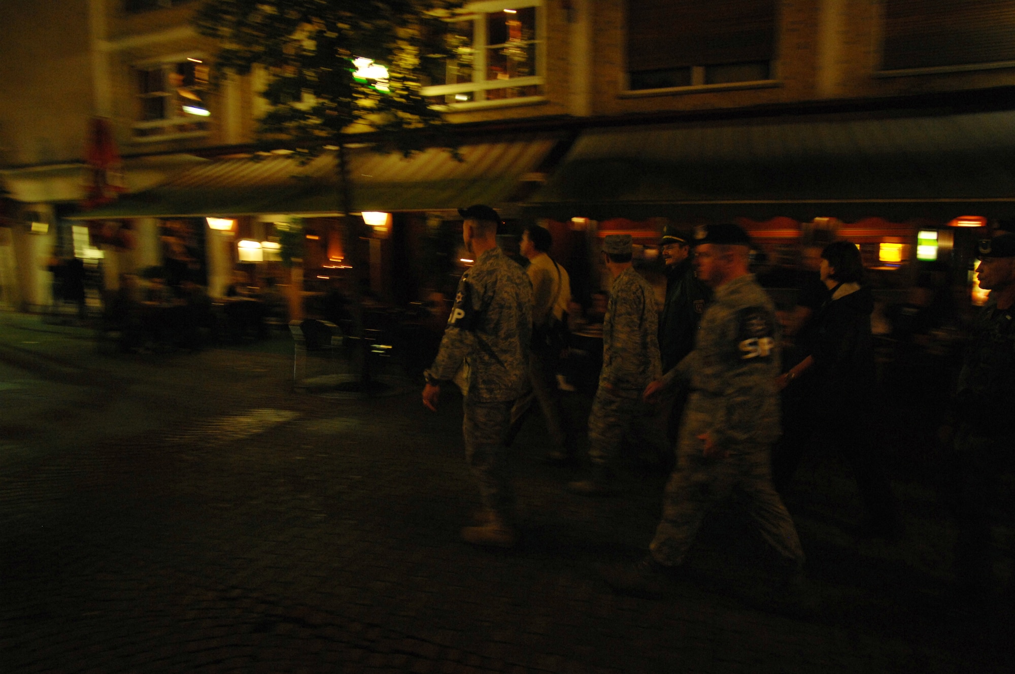 Members from the 569th United States Forces Police Squadron and local Polizei patrol downtown Kaiserslautern, Germany, Sept. 5, 2008.  The 569th USFPS and local Polizei work together to keep the streets of Kaiserslautern safe.  (U.S. Air Force photo by Senior Airman Amber Bressler)(Released)