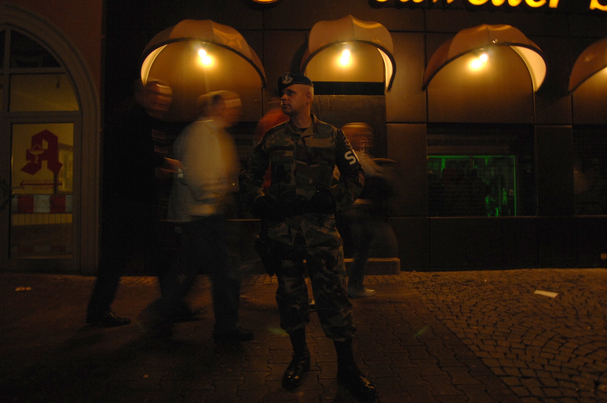 ZP-3 Kai Mueller, 569th United States Forces Police Squadron, patrols downtown Kaiserslautern, Germany, Sept. 5, 2008.  The 569th USFPS and local Polizei work together to keep the streets of Kaiserslautern safe.  (U.S. Air Force photo by Senior Airman Amber Bressler)(Released)