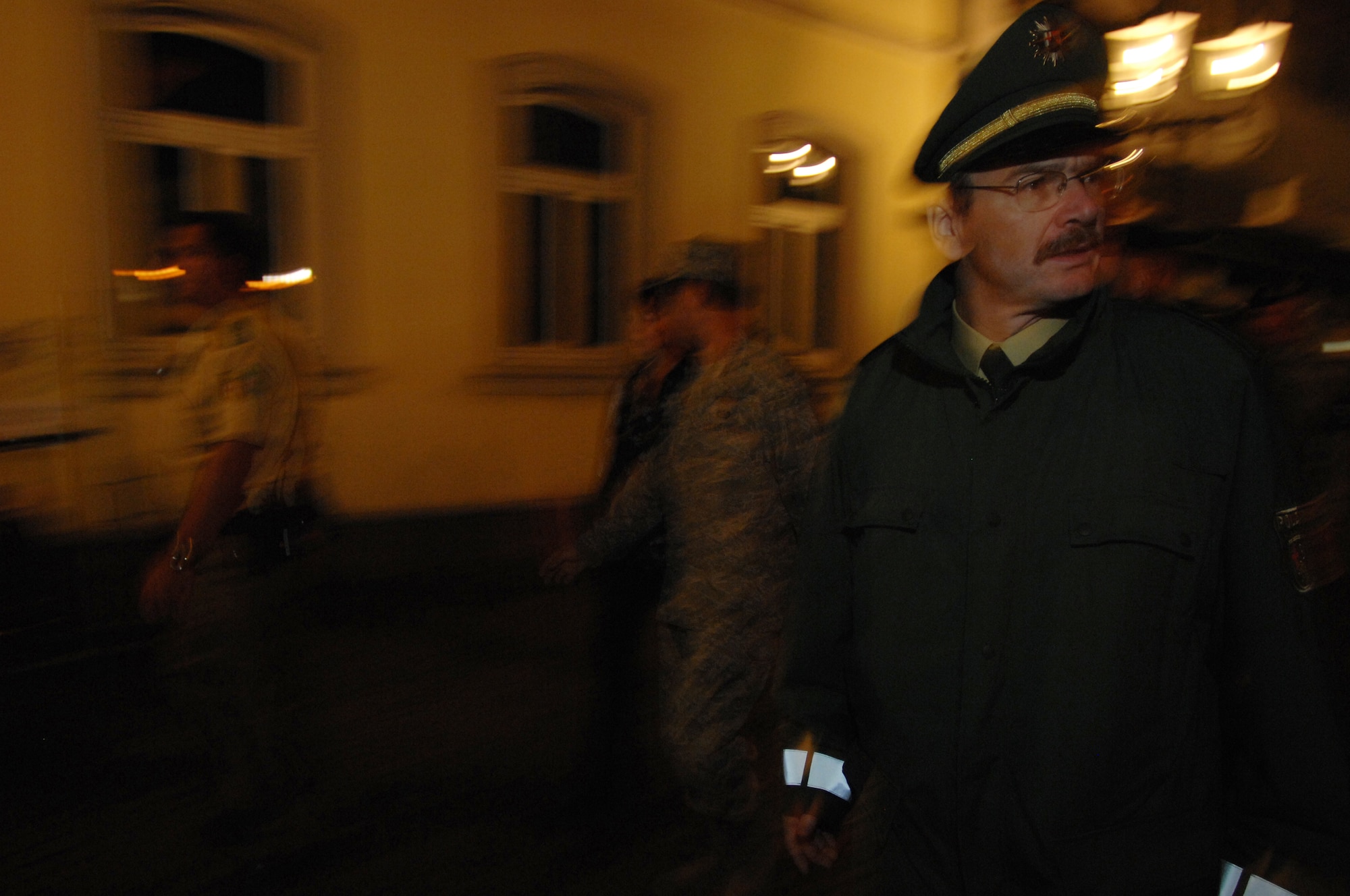 Polizeidirektor Thomas Bruhl (right) and members from the 569th United States Forces Police Squadron  patrol the streets of down town Kaiserslautern, Germany, Sept. 5, 2008. The 569th USFPS and local Polizei work together to keep the streets of Kaiserslautern safe.  (U.S. Air Force photo by Senior Airman Amber Bressler)(Released)
