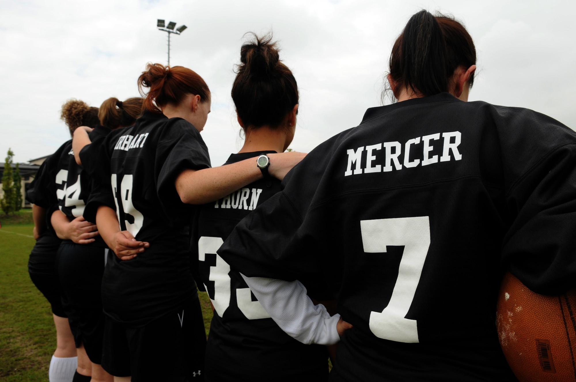 Members of the Lady Knights flag football team wrap up a practice, Ramstein Air Base, Germany, Sep. 10, 2008. (U.S. Air Force photo by Senior Airman Kelly LeGuillon)(Released)