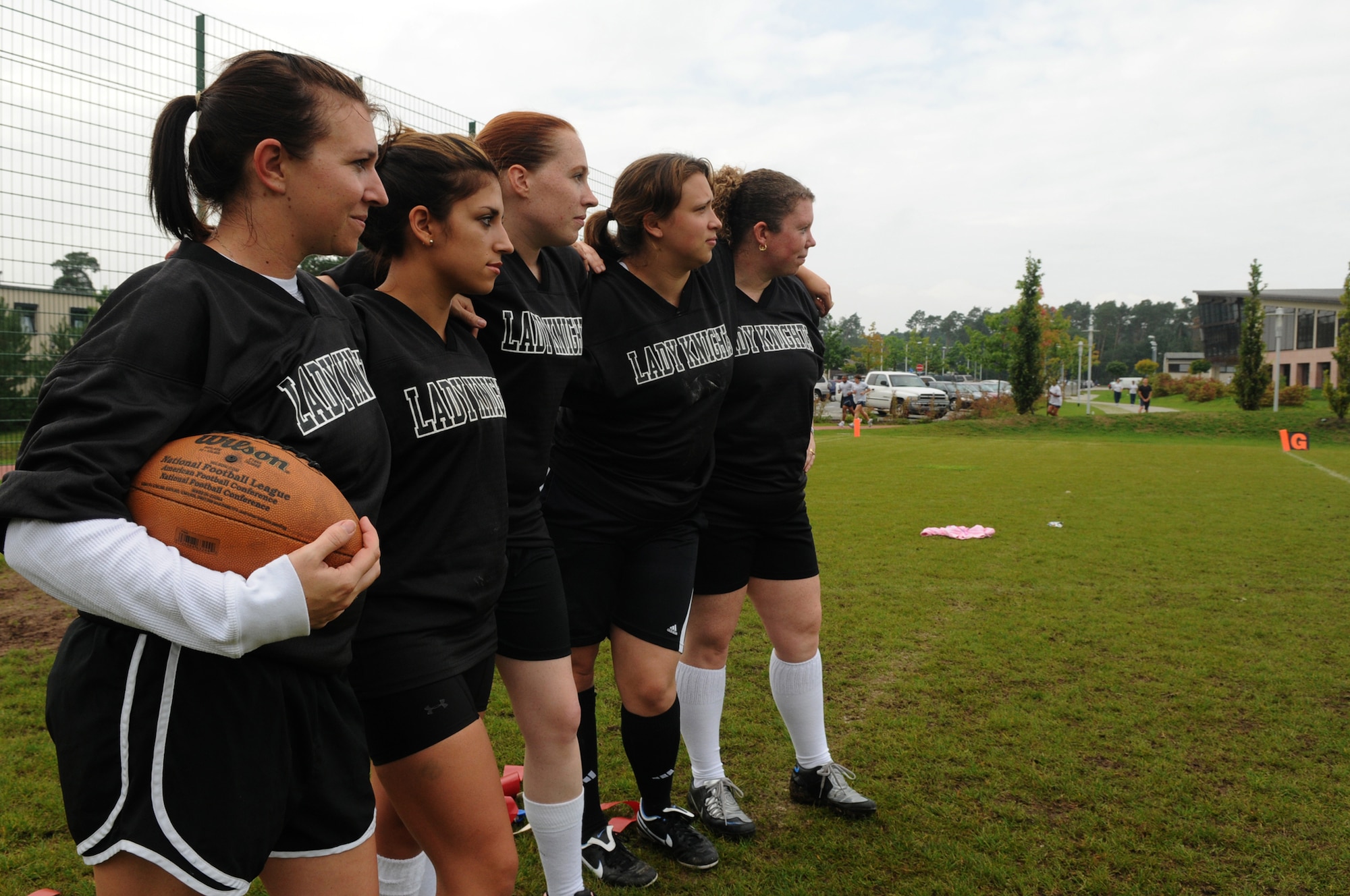 Members of the Lady Knights flag football team wrap up a practice, Ramstein Air Base, Germany, Sep. 10, 2008. (U.S. Air Force photo by Senior Airman Kelly LeGuillon)(Released)