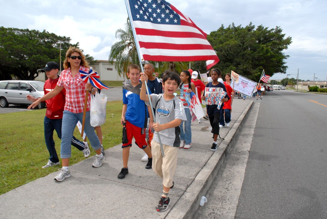 Children from Ryuku Middle School on Kadena Air Base in Okinawa, Japan, conduct a Freedom Walk on Sept. 11, 2008. U.S. Air Force photo by Staff Sgt. Angelique Perez 