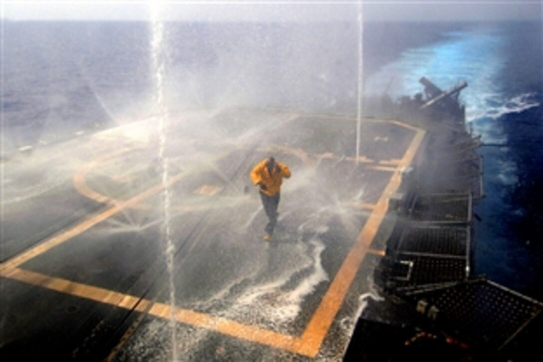 U.S. Navy Chief Petty Officer Kevin Wright checks the effectiveness of the counter measure wash down system aboard the guided-missile cruiser USS Vella Gulf in the Mediteranean Sea, Sept. 10, 2008. Vella Gulf is deployed as part of the Iwo Jima Expeditionary Strike Group supporting maritime security operations in the U.S. 5th and 6th Fleet areas of responsibility.