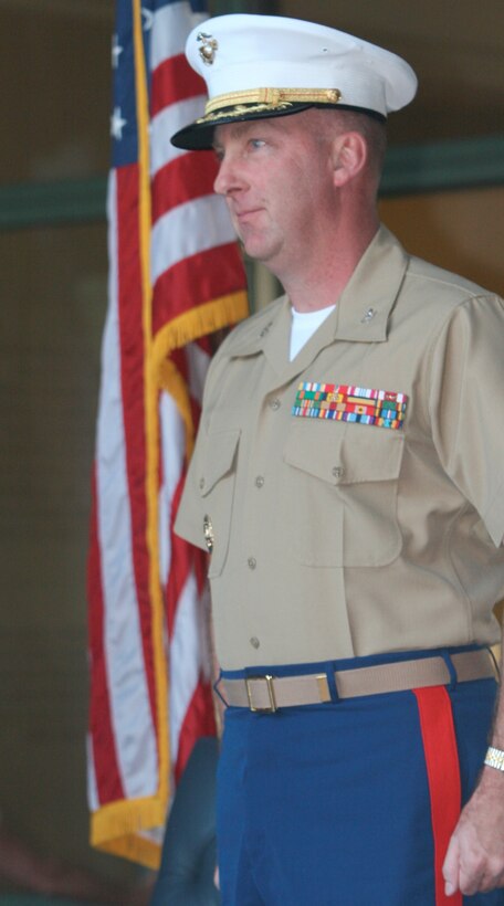Col. James B. Seaton III, commanding officer, Marine Corps Base Camp Pendleton, stands at attention during a salute to the military. Seaton spoke at the third annual Simi Valley Freedom Walk to remember the events of 9/11 and honor America's heroes at the Ronald Reagan Presidential Library, Sept. 11.