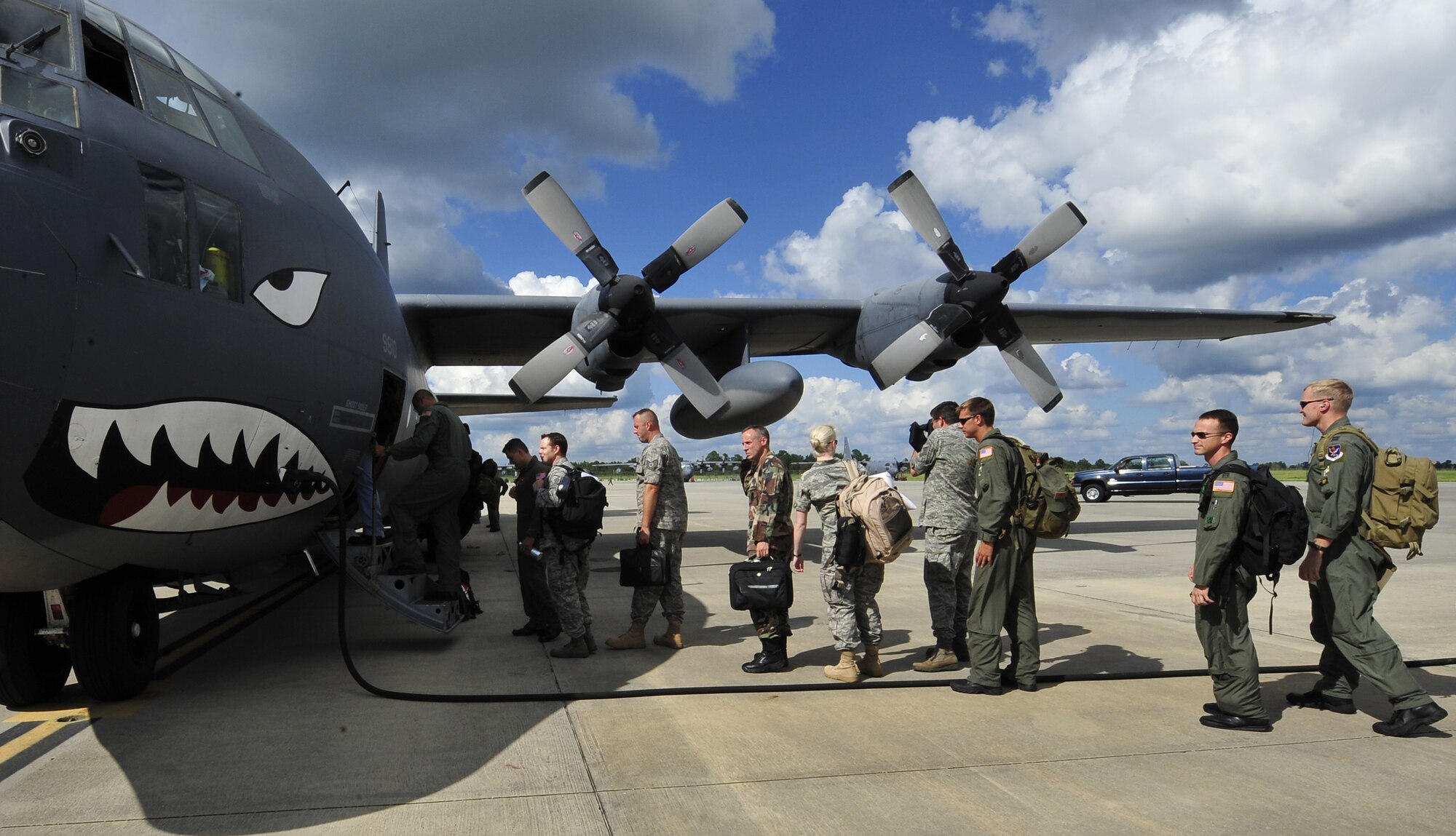 MOODY AIR FORCE BASE, Ga. – 23rd Wing Airmen board a HC-130E Hercules here Sept. 13. The Airmen are deploying to provide relief in response to Hurricane Ike. (U.S. Air Force photo by Senior Airman Elizabeth Rissmiller)