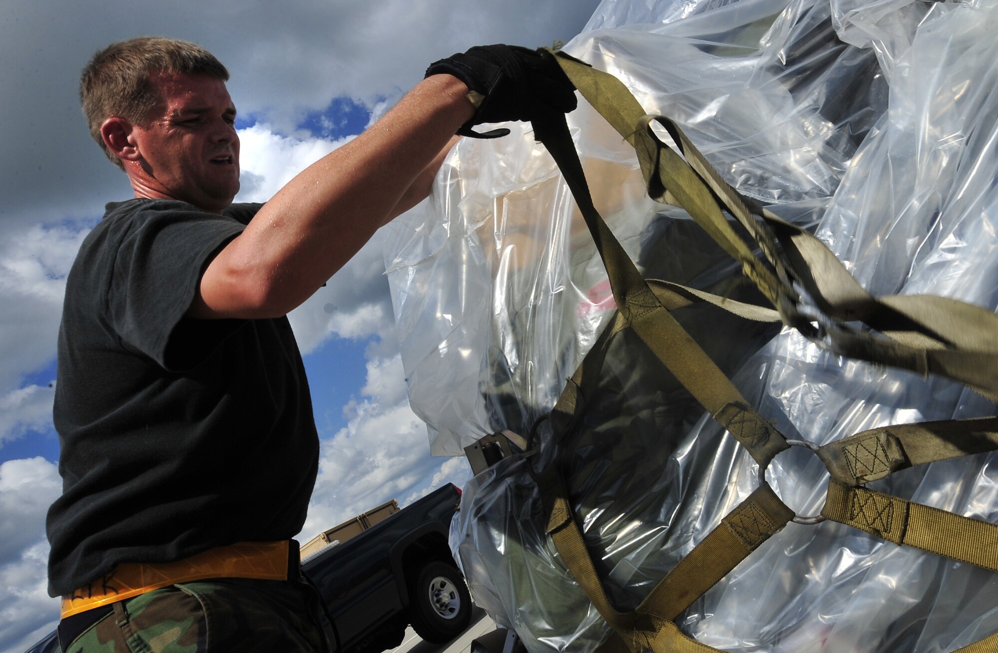 MOODY AIR FORCE BASE, Ga. – Staff Sgt. Jerry Good, 23rd Logistics Readiness Squadron air terminal operations, builds a baggage pallet here Sept. 13. The pallet is baggage of 23rd Wing Airmen who are deploying in response to hurricane Ike. (U.S. Air Force photo by Senior Airman Elizabeth Rissmiller)