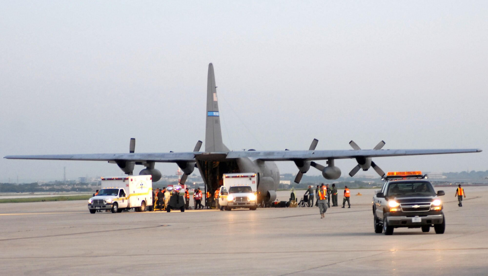 Airmen from the 37th Training Wing and 59th Medical Wing at Lackland Air Force Base in San Antonio unload hospital patients Sept. 12 evacuated from Beaumont, Texas.  The patients were transported in C-130 Hercules aircraft by aircrews from Little Rock AFB and medical Airmen from the 908th Aeromedical Evacuation Squadron at Scott AFB, Ill., in preparation for Hurricane Ike's landfall in southern Texas.  (U.S. Air Force photo/Staff Sgt. Chris Willis)