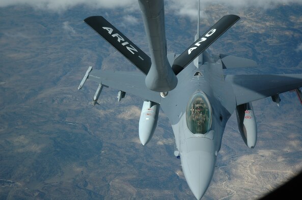 A New Mexico Air National Guard F-16 prepares to be refueled Sept. 9, 2008, by the Air National Guard's 161st Air Refueling Wing on the way to Colorado Springs, Colo. Thirty-one community members joined the 944th Fighter Wing from Luke Air Force Base, Ariz., and the Air National Guard's 161st Air Refueling Wing from Sky Harbor International Airport for a civic leader tour. (U.S. Air Force photo/Tech. Sgt. Susan Stout)