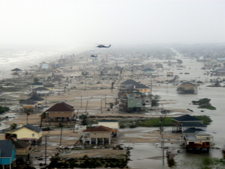 Two Joint Task Force 129 crews on board HH-60G Pave Hawks fly over Crystal Beach, Texas, Sept. 13. The JTF 129 crews rescued 48 people and pets stranded in the Galveston area. (U.S. Air Force photo/Tech. Sgt. Luigge Romanillo)