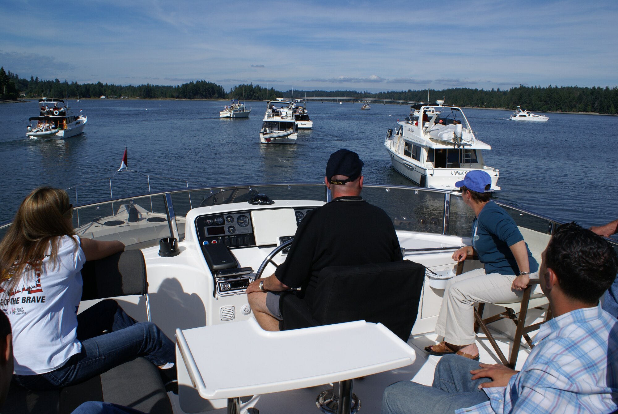 McChord airmen arrive at Foofaraw 2008 on Sept 5.  The 46th Annual military appreciation event honors the sacrifice of local Airmen, Soldiers, Sailors, Marines and Coast Guardsmen making service members the guest of the Thurston County Chamber of Commerce and Olympia Yacht Club for a day of fun.  Airmen were paired with local ship captains aboard private yachts and sailed to a Puget Sound Island owned by the Yacht Club for a day of sports, games and food. (U.S. Air Force photo/Master Sgt. Dean Miller)