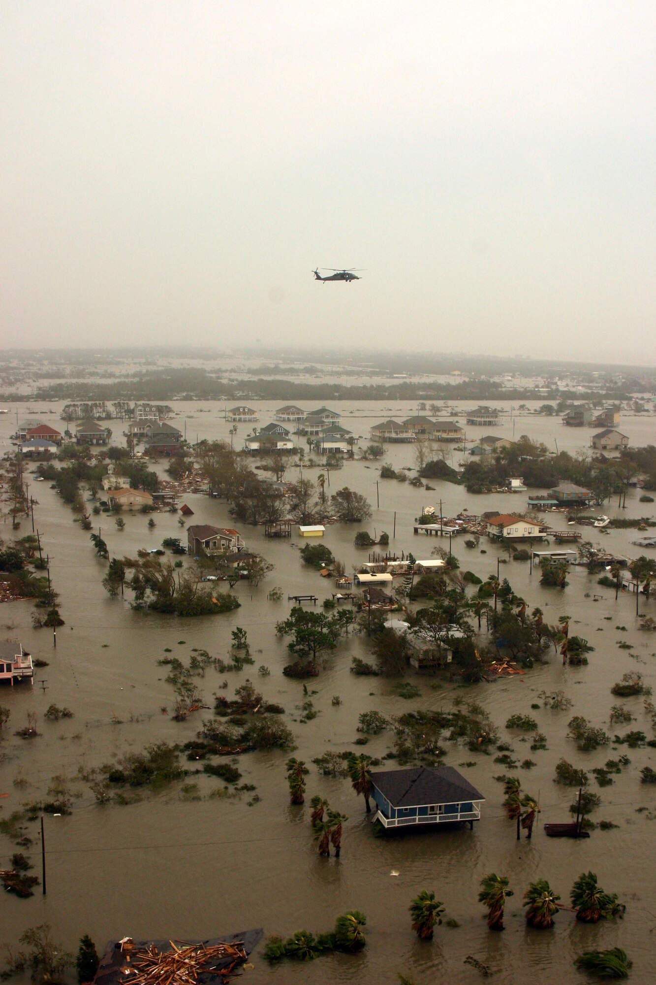 A Joint Task Force 129 crew on board an HH-60G Pave Hawk flies over the Galveston area Sept. 13 on the Gulf Coast of Texas. The JTF 129 crews rescued 48 people and pets stranded in the Galveston area. (U.S. Air Force photo/Tech. Sgt. Brock Woodward)