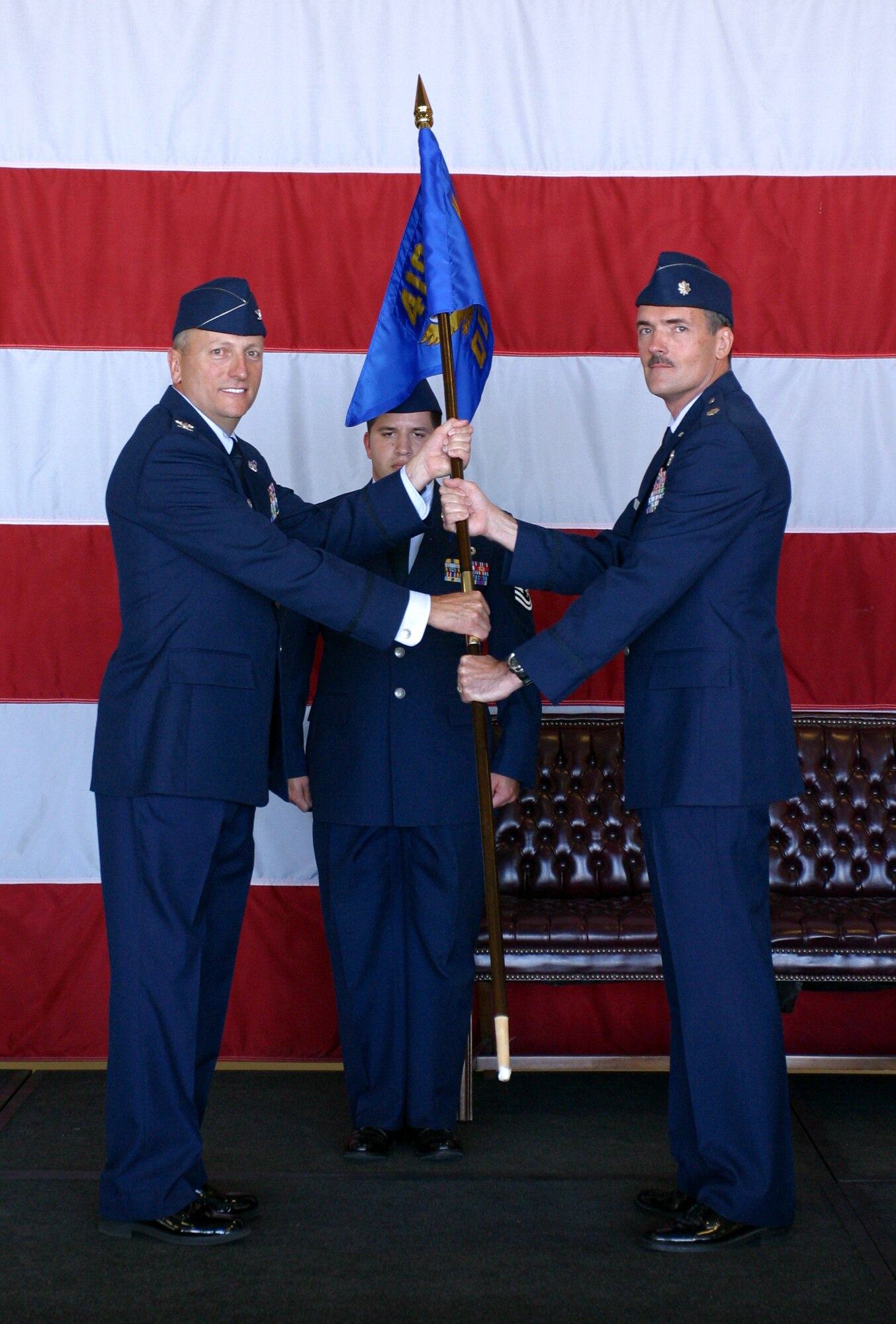 Lt. Col. William Lyons assumes command of the 419th Operations Group from Col. Walter Sams, commander of the 419th Fighter Wing during the September Unit Training Assembly.  (U.S. Air Force Photo/Staff Sgt Kyle Brasier)