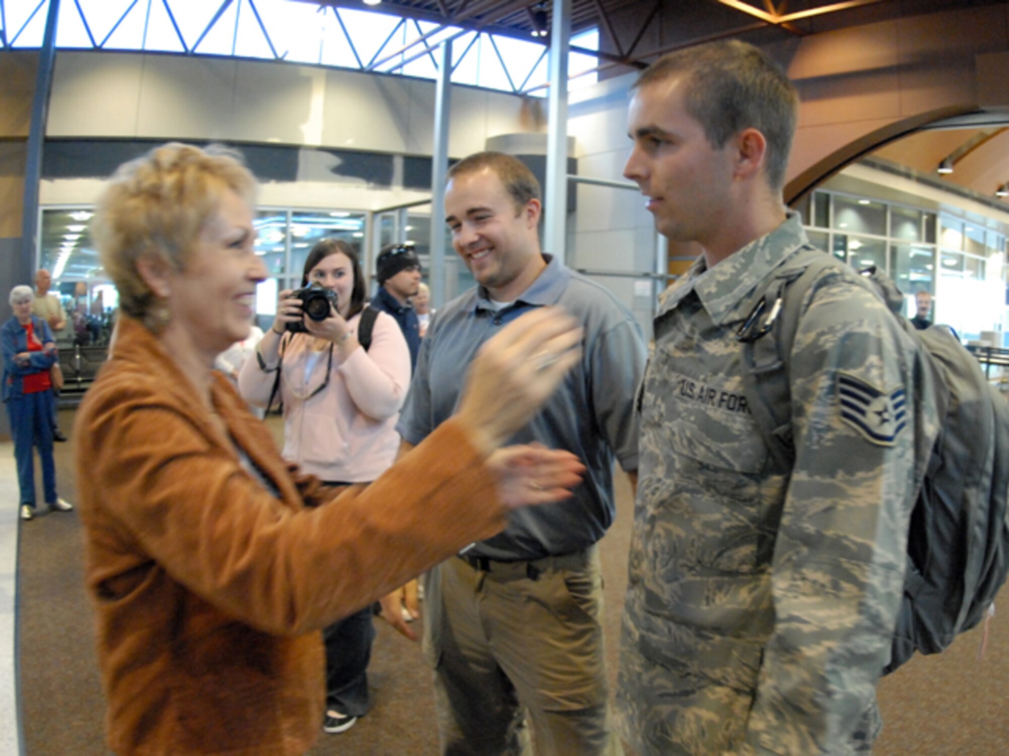 Staff Sgt. James Jennen of the 119th Wing greets his mother at Hector IAP in Fargo N.D. on Sept. 11.  Jennen deployed in Afghanistan in July 2008.
