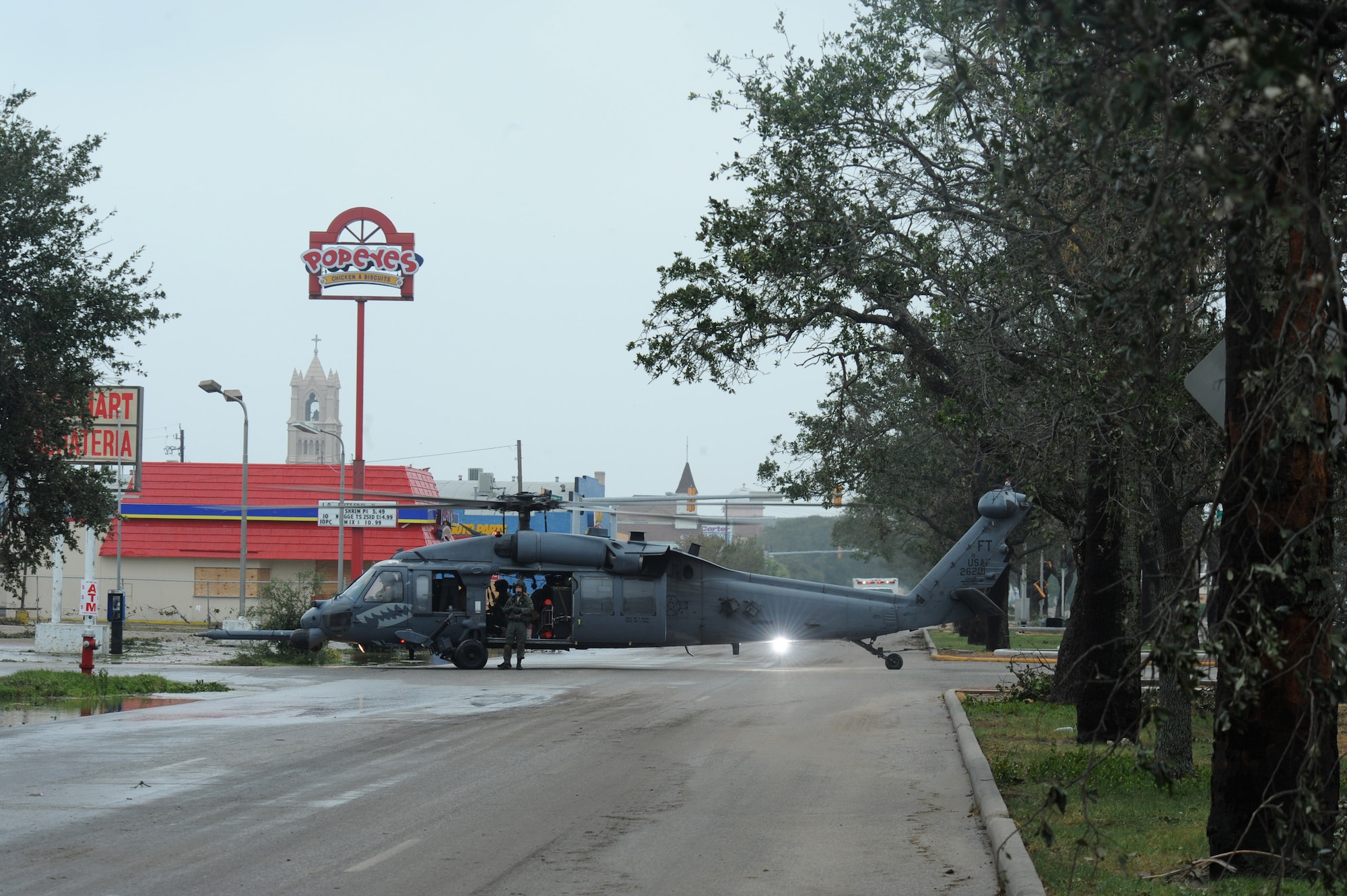 An HH-60 Pave Hawk assigned to the 331st Air Expeditionary Group at Randolph Air Force Base, Texas, sits in the street during operations in Galveston, Texas, after Hurricane Ike, Sept. 13. (U.S. Air Force photo/Staff Sgt. James L. Harper Jr.)
