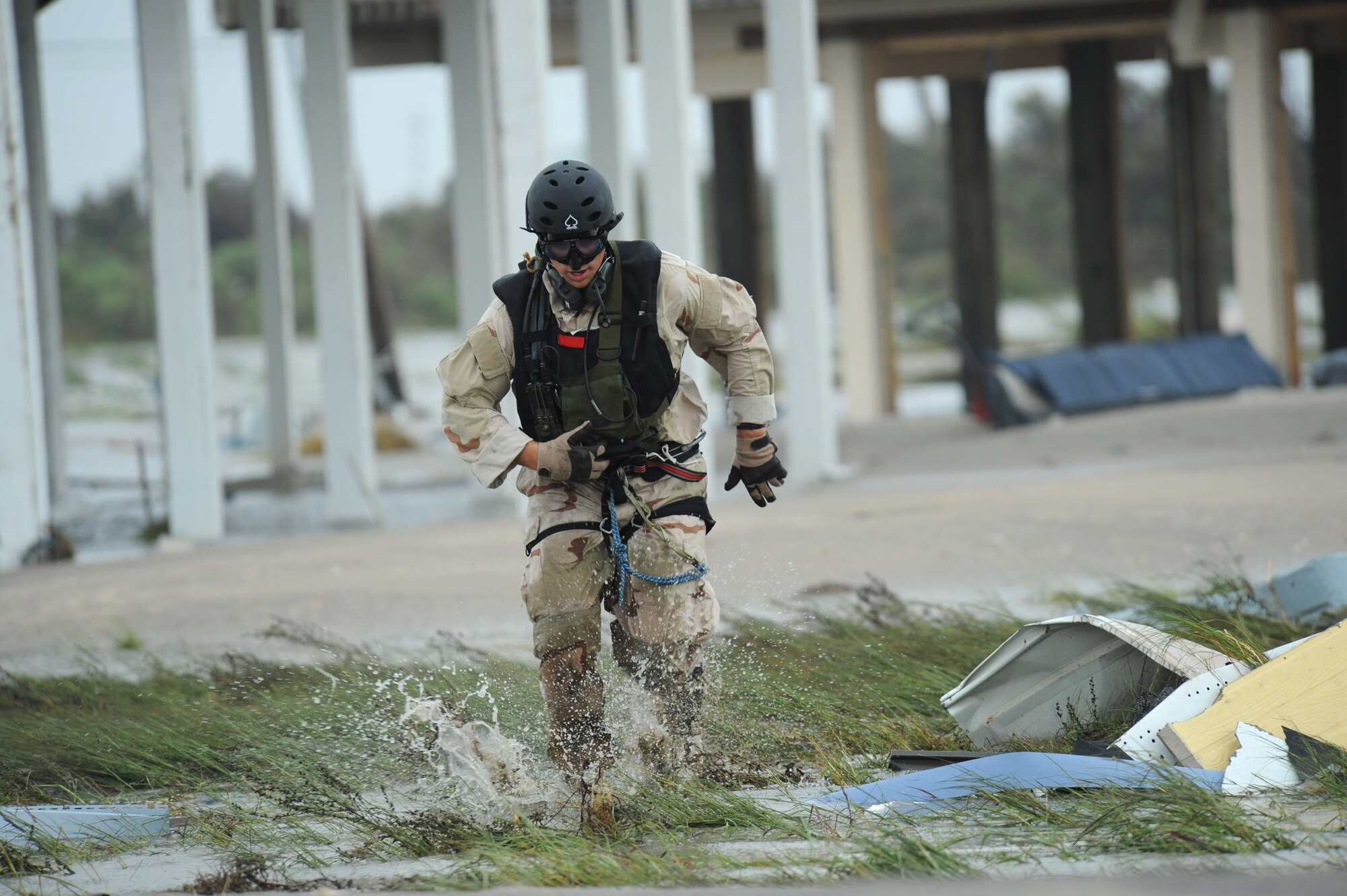 Pararescueman Staff Sgt. Lopaka Mounts conducts search and rescue operations in Galveston, Texas, after Hurricane Ike, Sept. 13. Sergeant Mounts is assigned to the 331st Air Expeditionary Group at Randolph Air Force Base, Texas. (U.S. Air Force photo/Staff Sgt. James L. Harper Jr.)