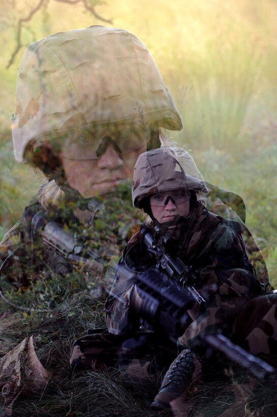 Staff Sgt. Rachel Nelson, 28th Security Forces Squadron police officer, stays alert while maintaining parameter security around a house during an exercise on Sept. 12. The exercise was designed to train various police agencies in special weapons and tactics. (U.S. Air Force photo/Senior Airman Marc I. Lane)