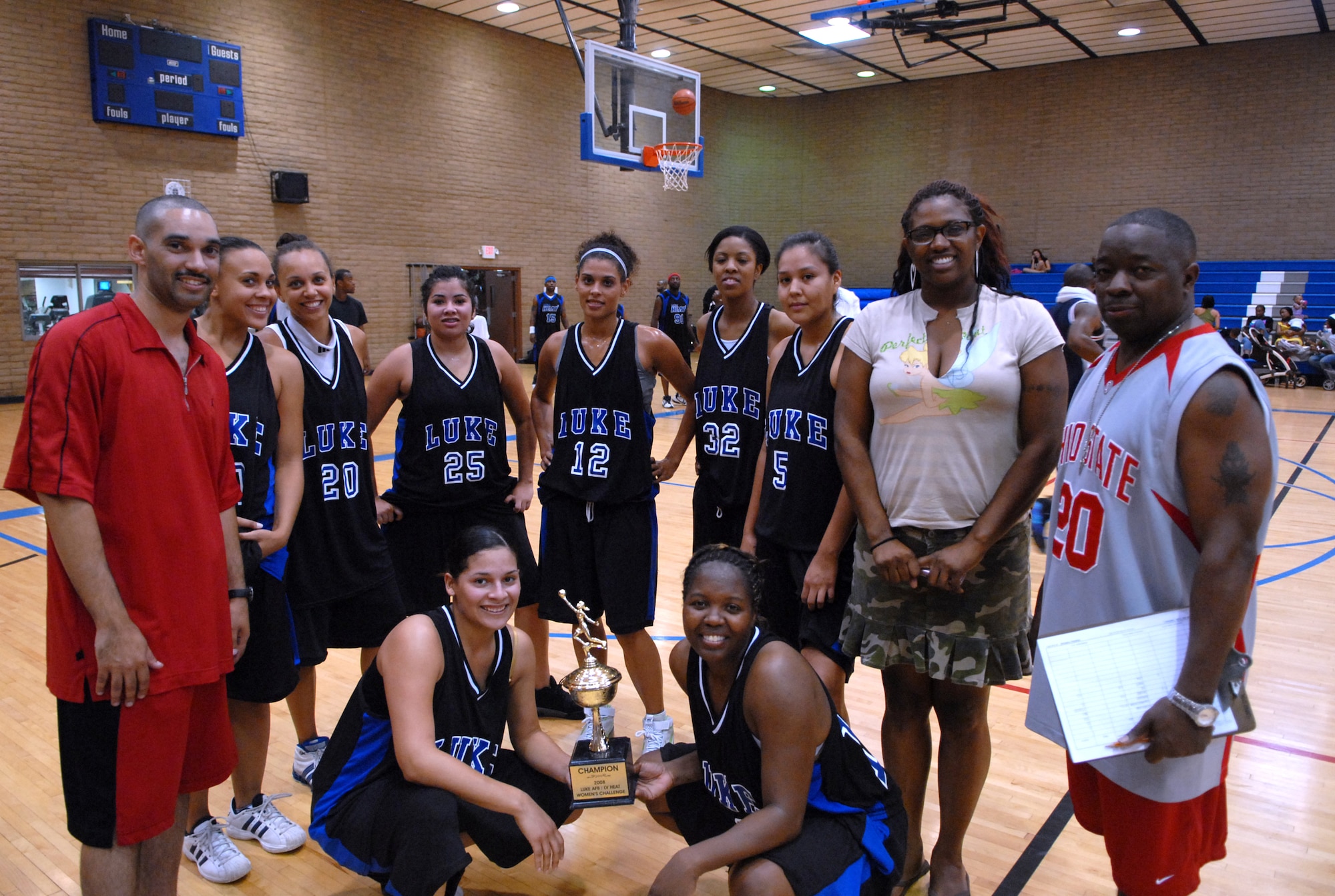 The Luke women's varsity basketball team members are, from left, Coach Jamal Williams, Heather Wyatt, Brandee hudson, Liz Wyatt, Jessica Taylor, Constance Maddoz, Justine Harwood, Traci Dobbins, Coach Mike Carr, Amber Jones and Tamika Daniel. Not pictured are Brigette Krol, Melissa Sanford, Juanita Mebane and Caroline Jones.