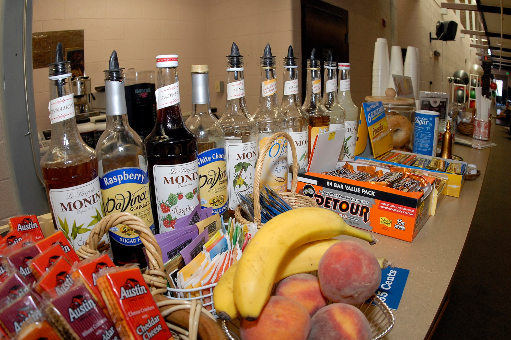 A wide selection of coffee flavors, teas, espressos, fruits and other healthy snacks offered at the new Wild Blue Yonder health bar in the Peterson Fitness and Sports Center. Wild Blue Yonder opened for business Aug. 21. (U.S. Air Force photo/Rob Bussard)