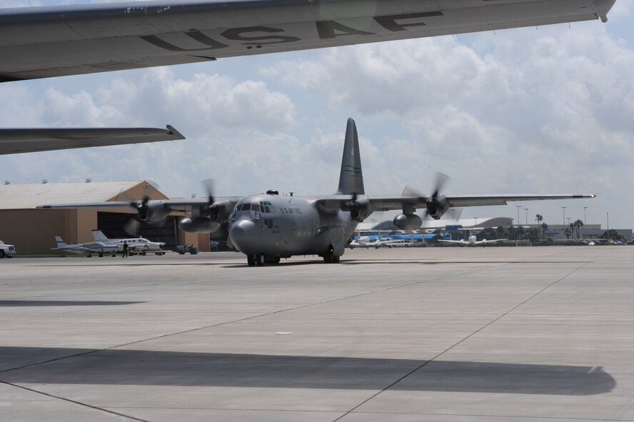 CORPUS CHRISTI, Texas- A C-130 from Little Rock Air Force Base, Arkansas, prepares to taxi to the flight line for takeoff  here,  Sept. 11. Between 1 a.m. and 4 a.m. early Thursday morning patients were loaded on to two C-130's for transport.  The Air Force and other military forces not only respond in support of war efforts abroad but also to threats on the home front including natural disasters. (U.S. Air Force photo/ Senior Airman Courtney Richardson) 