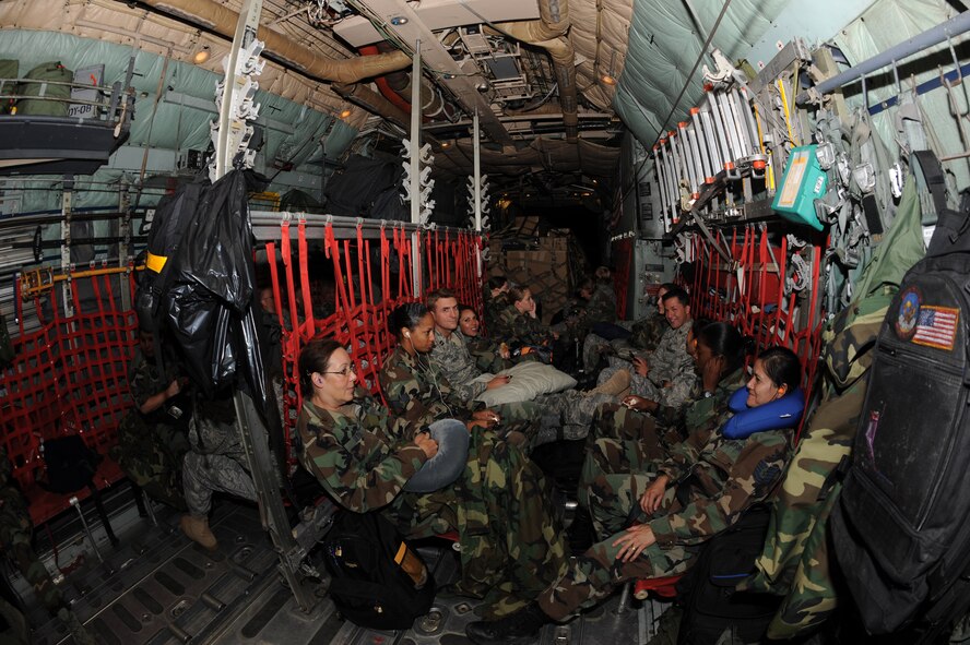 SCOTT AIR FORCE BASE, IL. - Medical Technicians and Aerospace Evacuation Teams \ get comfortable on a Dyess Air Force Base C-130 for their three hour trip to south Texas to aide Hurricane Ike evacuees, Sept. 10. The airmen, along with three United States Navy personnel, also brought medical supplies and MRE's along with them. The Air Force and other military forces not only respond in support of war efforts abroad but also to threats on the home front including natural disasters. (U.S. Air Force photo/ Senior Airman Courtney Richardson) 