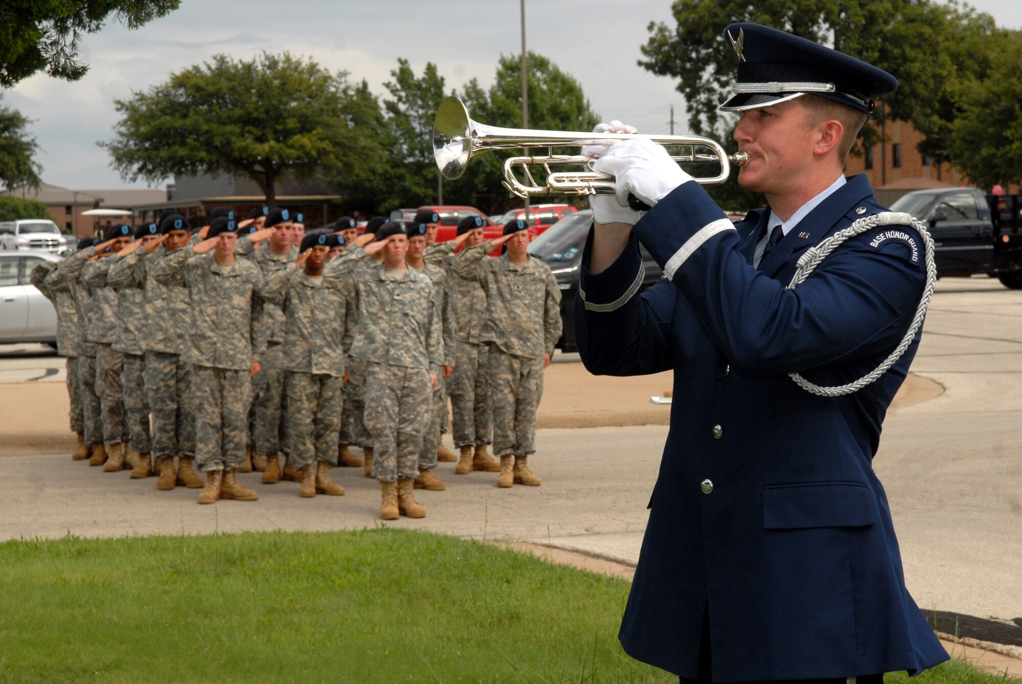 Captain Stephen Carlton, 17th Training Wing Honor Guard, plays "Taps" during the 2008 Prisoner of War / Missing in Action vigil Sept. 11. The vigil continued through the night and culminated at the 2008 Air Force Ball. (U.S. Air Force photo by Senior Airman Kasabyan Musal)