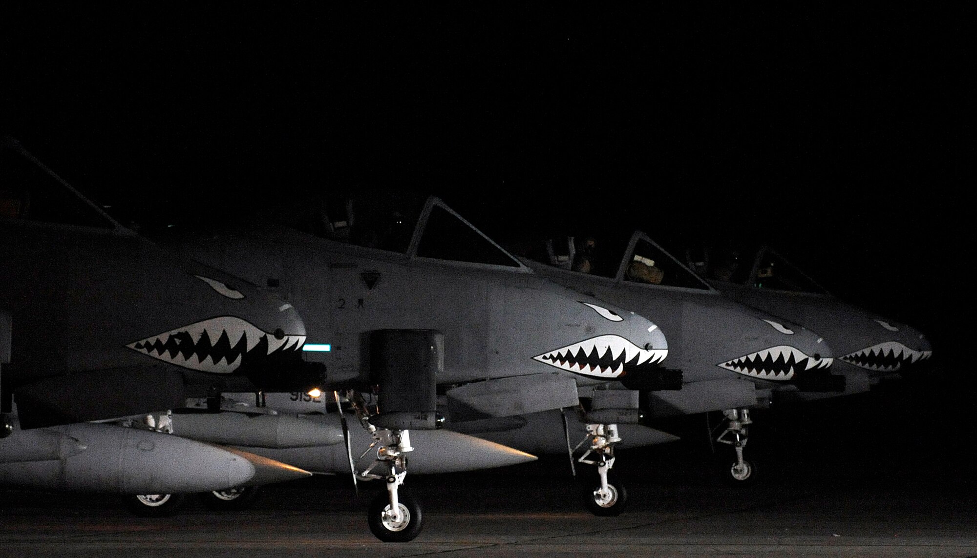 MOODY AIR FORCE BASE, Ga. -- Four A-10C Thunderbolt II aircraft sit at the end of the runway before take off here Sept. 8. The 75th Fighter Squadron is deploying from Moody AFB for the first time in support of Operation Enduring Freedom. (U.S. Air Force photo by Senior Airman Brittany Barker)