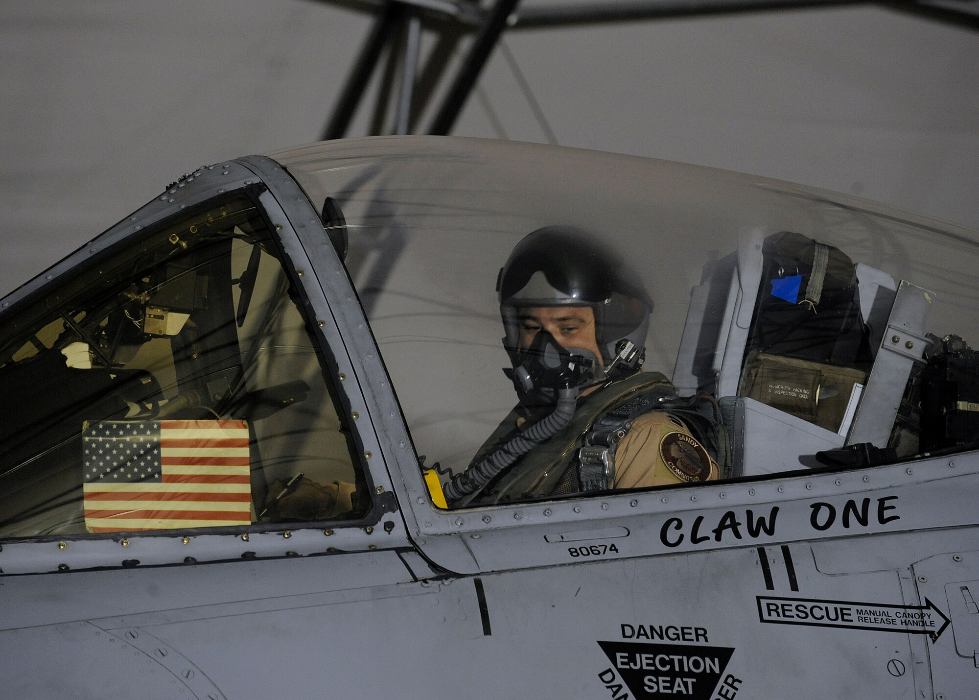 MOODY AIR FORCE BASE, Ga. -- An A-10C Thunderbolt II pilot smiles at a crew chief before preparing to taxi out of the hangar here Sept. 8. The 75th Fighter Squadron is deploying from Moody AFB for the first time. (U.S. Air Force photo by Senior Airman Brittany Barker)