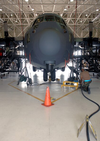 MOODY AIR FORCE BASE, Ga. -- Staff Sgt. Michael Scales, 23rd Equipment Maintenance Squadron aero repair isochronal craftsman, prepares a HC-130P Hercules for an operation check here Sept. 5. Sergeant Scales checks the nose and main landing gear to ensure everything complies with standards. (U.S. Air Force photo by Airman Joshua Green) 